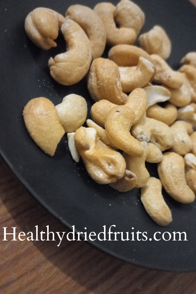 Salted Cashew Nuts In Black Plate